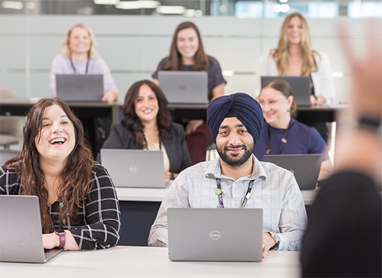 Employees in training room